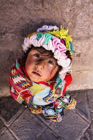 Young girl in traditional clothing in Cuzco, Peru