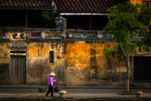 Ochre walls of Hoi An with warm yellow and purple tones